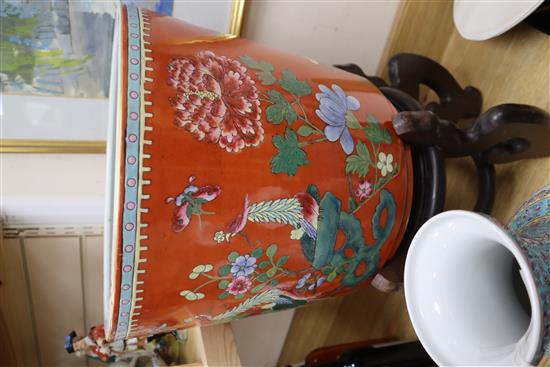 A Chinese coral ground famille rose jardiniere, wood stand Total height 60cm